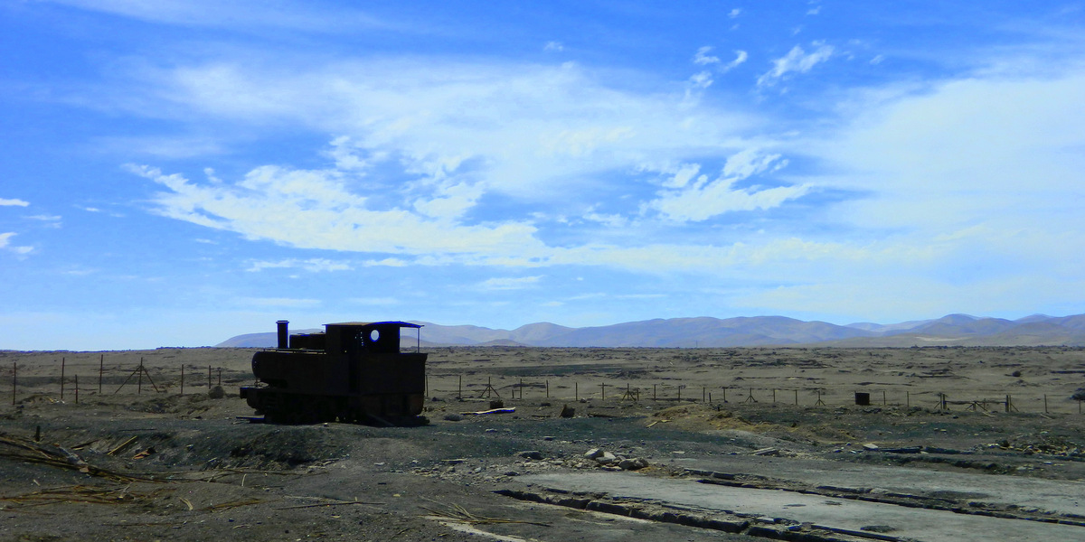 train with clouds.JPG